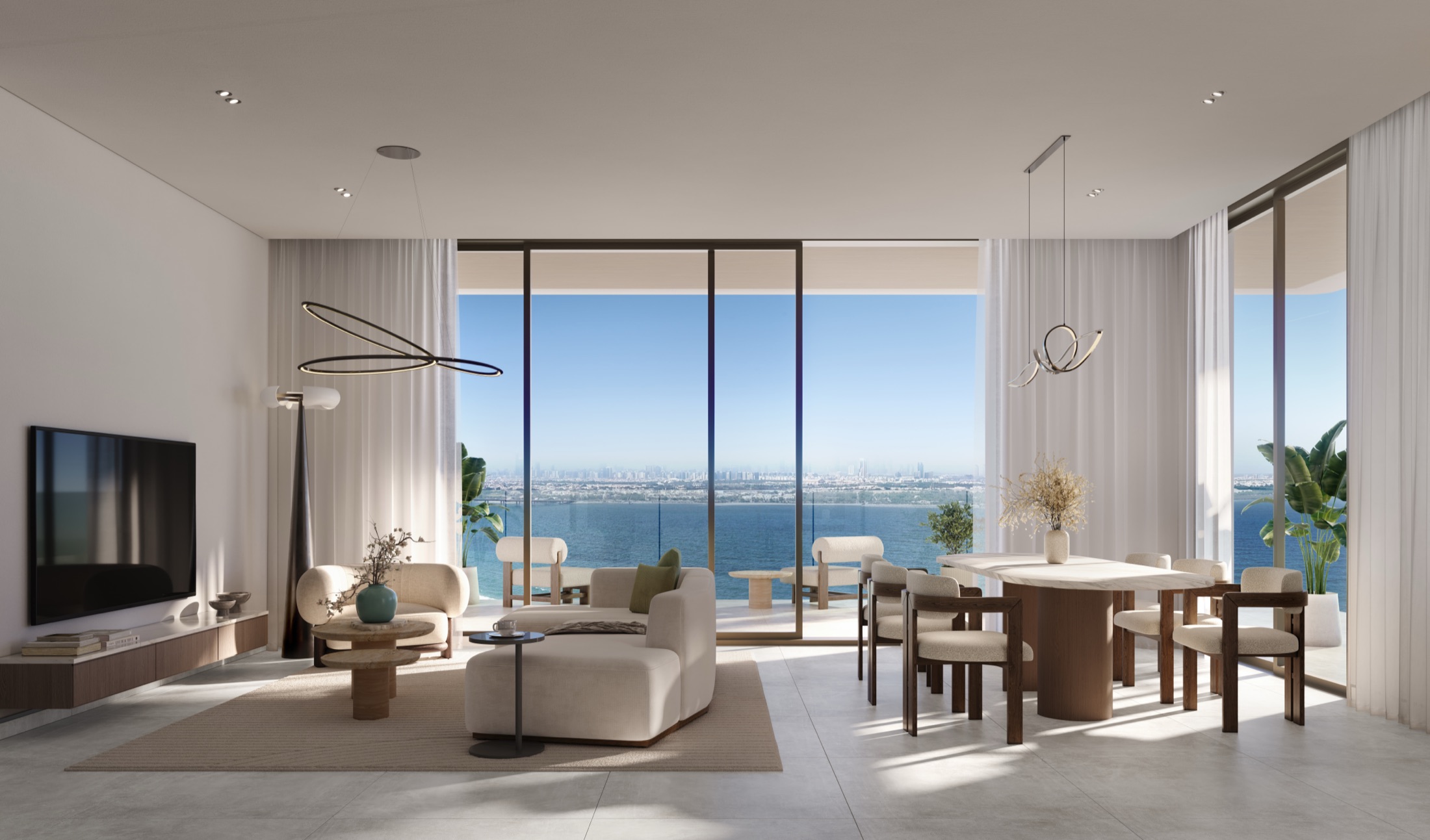 Bashayer Residences — living and dining room interior overlooking the water