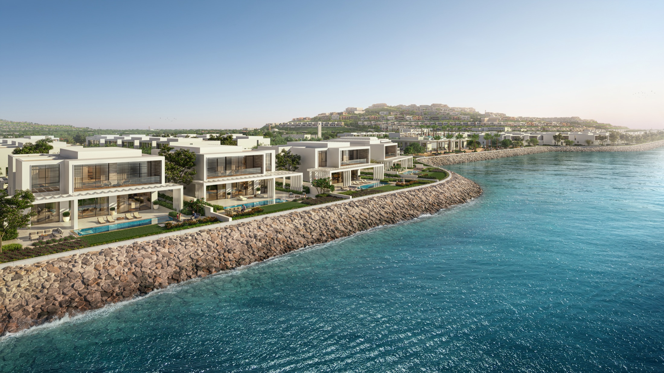 Bashayer Villas — coastal row of villas with private pools along the rock revetment, Hudayriyat Island
