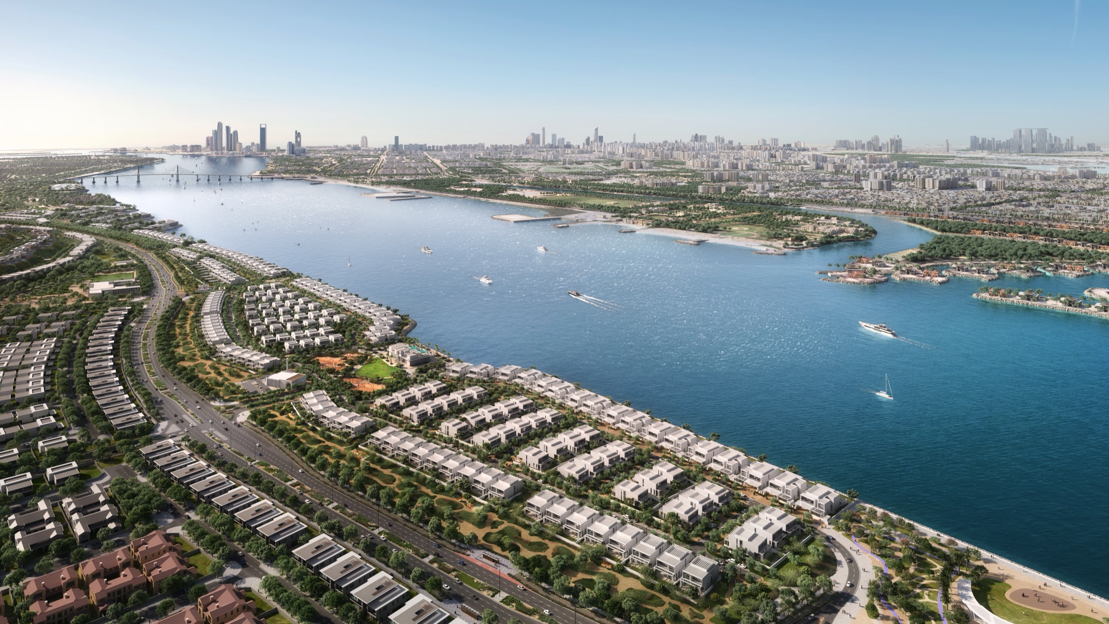 Bashayer by MODON — aerial view of the Al Bateen Channel with the Abu Dhabi skyline beyond, Hudayriyat Island