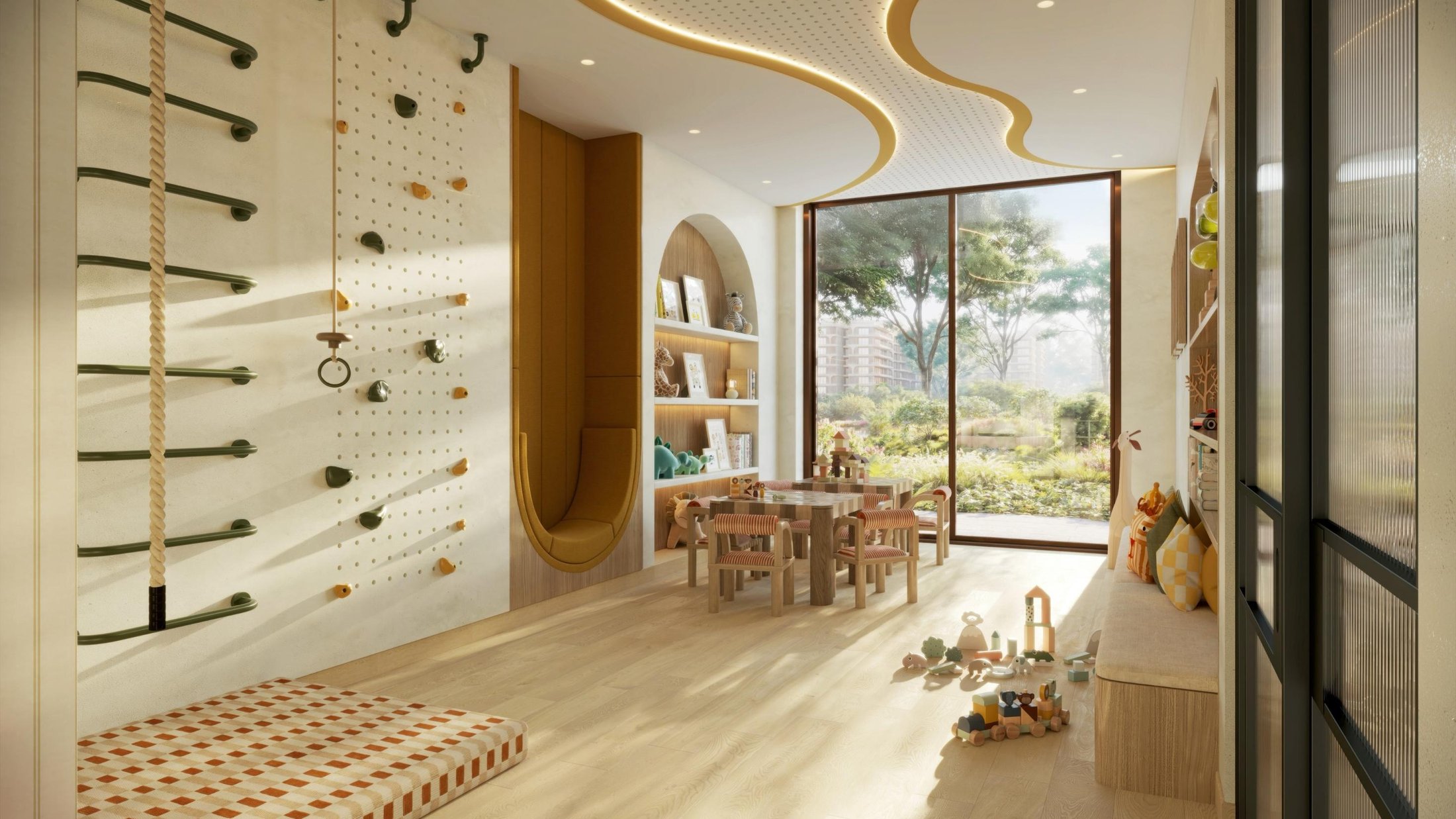 The Canopies at Yas Point — indoor kids' play area with climbing wall and reading nook