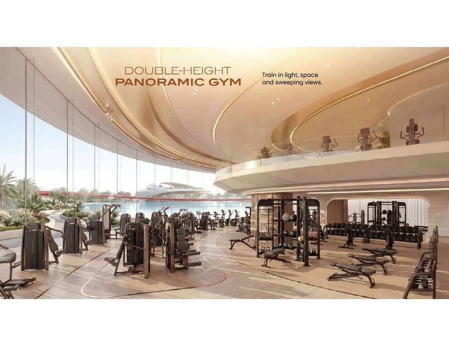 The Club House — double-height panoramic gym and indoor lounges at Greenz