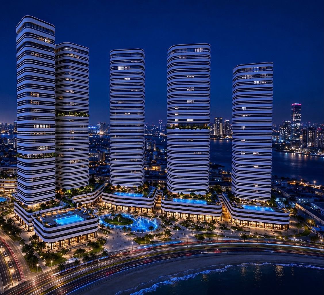 Linar by Alef Group — five towers lit at night on Al Mamzar Beach, Sharjah