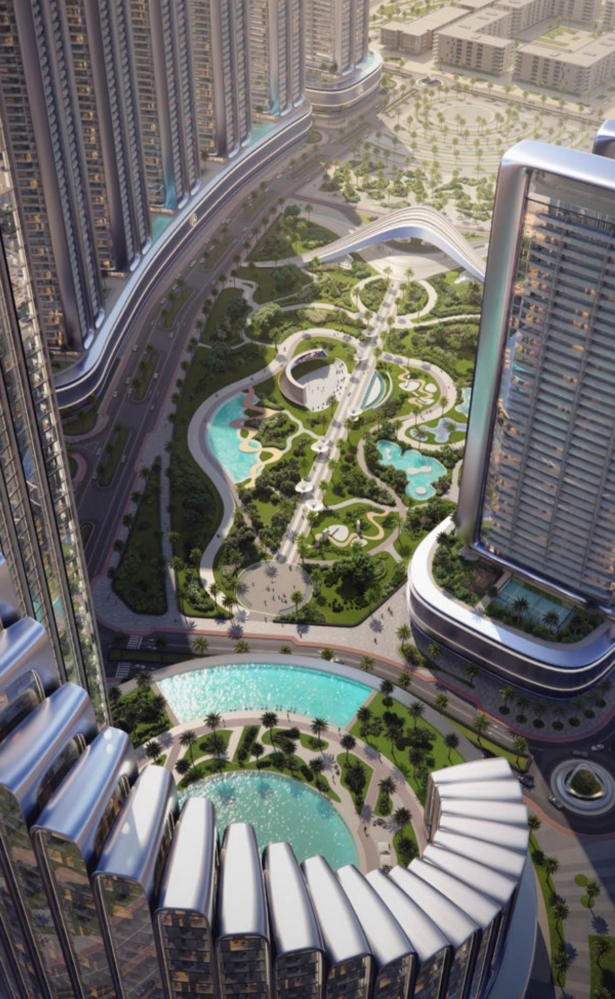 Aerial view of the 12-acre Grand Promenade — landscaped park at the heart of Mercedes-Benz Places Binghatti City