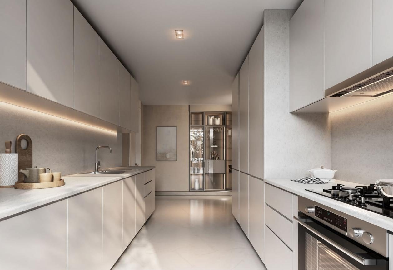 The Terraces at Sobha City — galley kitchen with stone counters and integrated cabinetry